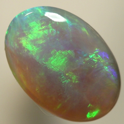 SOLID SEMI BLACK OPAL Large rolling flashes from orange to green with purple